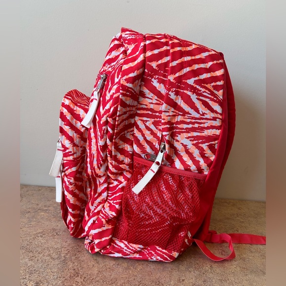 Jansport Backpack in Red, Orange and White Animal like print - Picture 2 of 10